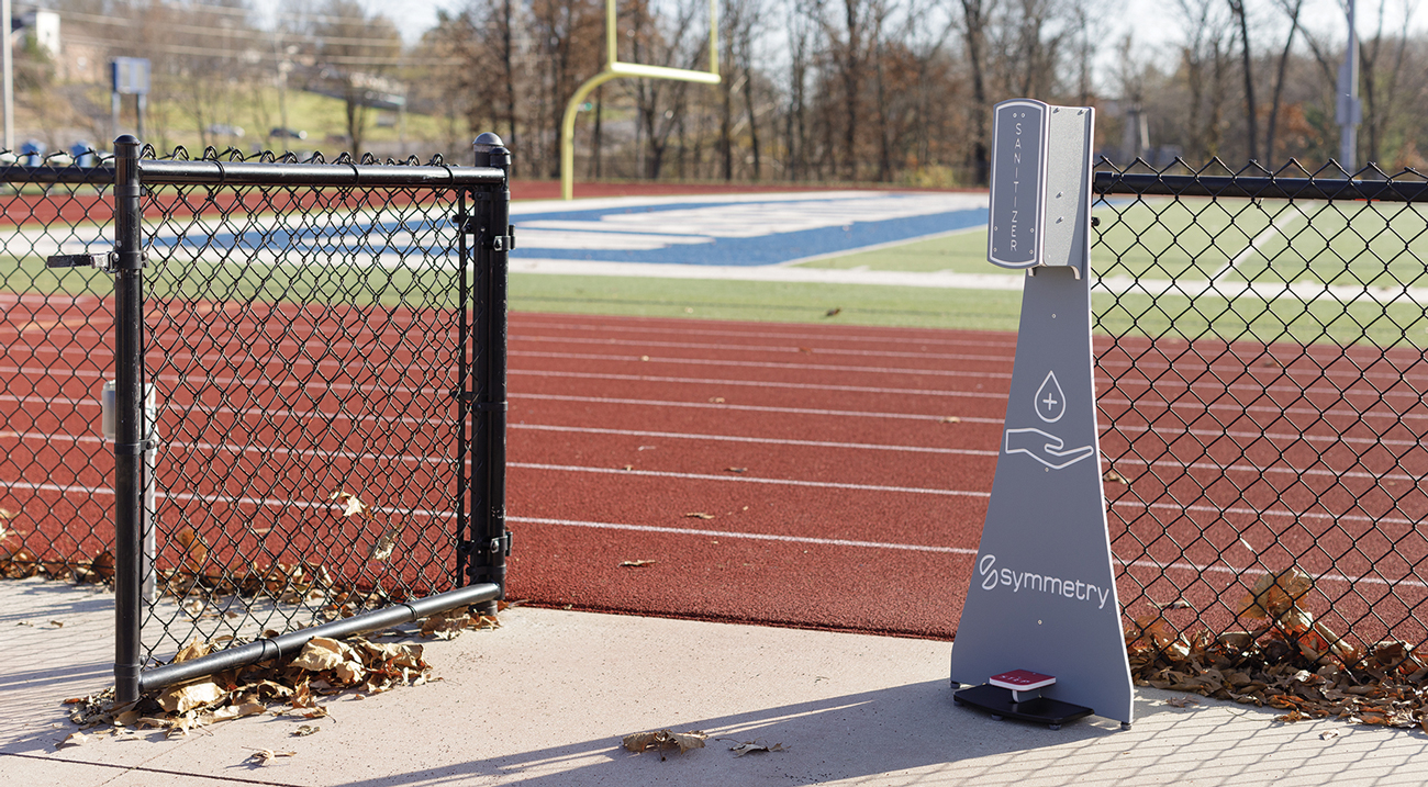 Hands-Free Dispenser Stand on a High-School Track